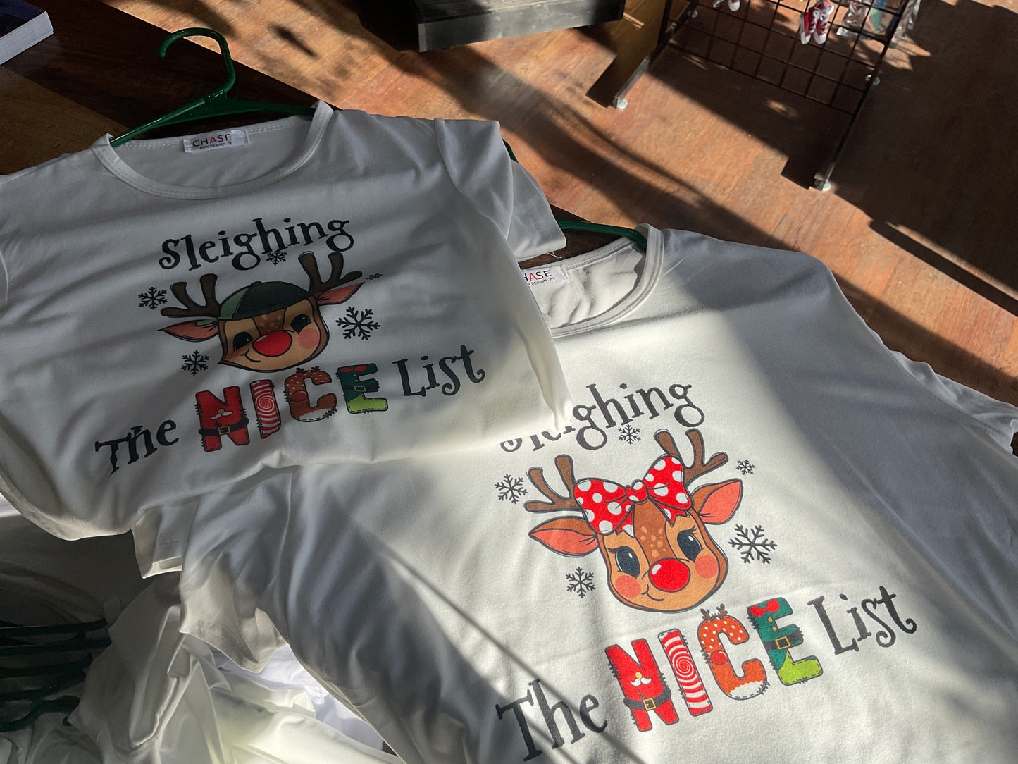 KIDS SLEIGHING THE NICE LIST TSHIRT