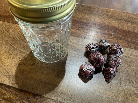 LARGE METAL SPIKE DICE BLOOD SPLATTER